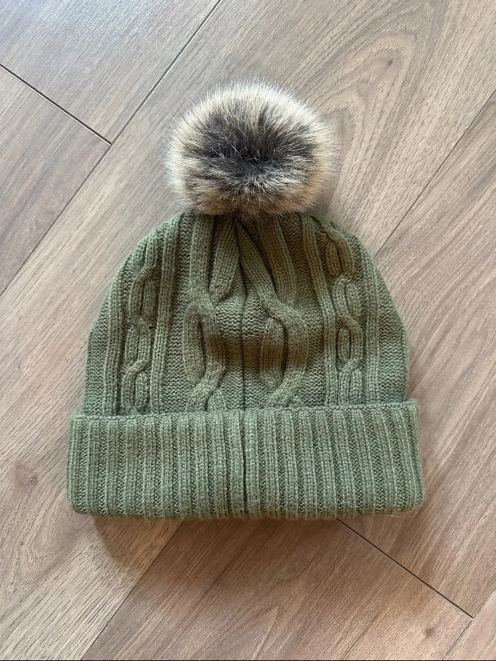 Carhartt beanie hat with faux fur Pom Pom . Like new!